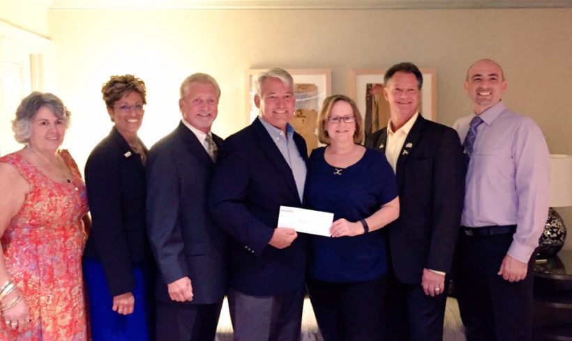 Presenting Rep. Dennis A. Ross with a BUILD PAC Contribution